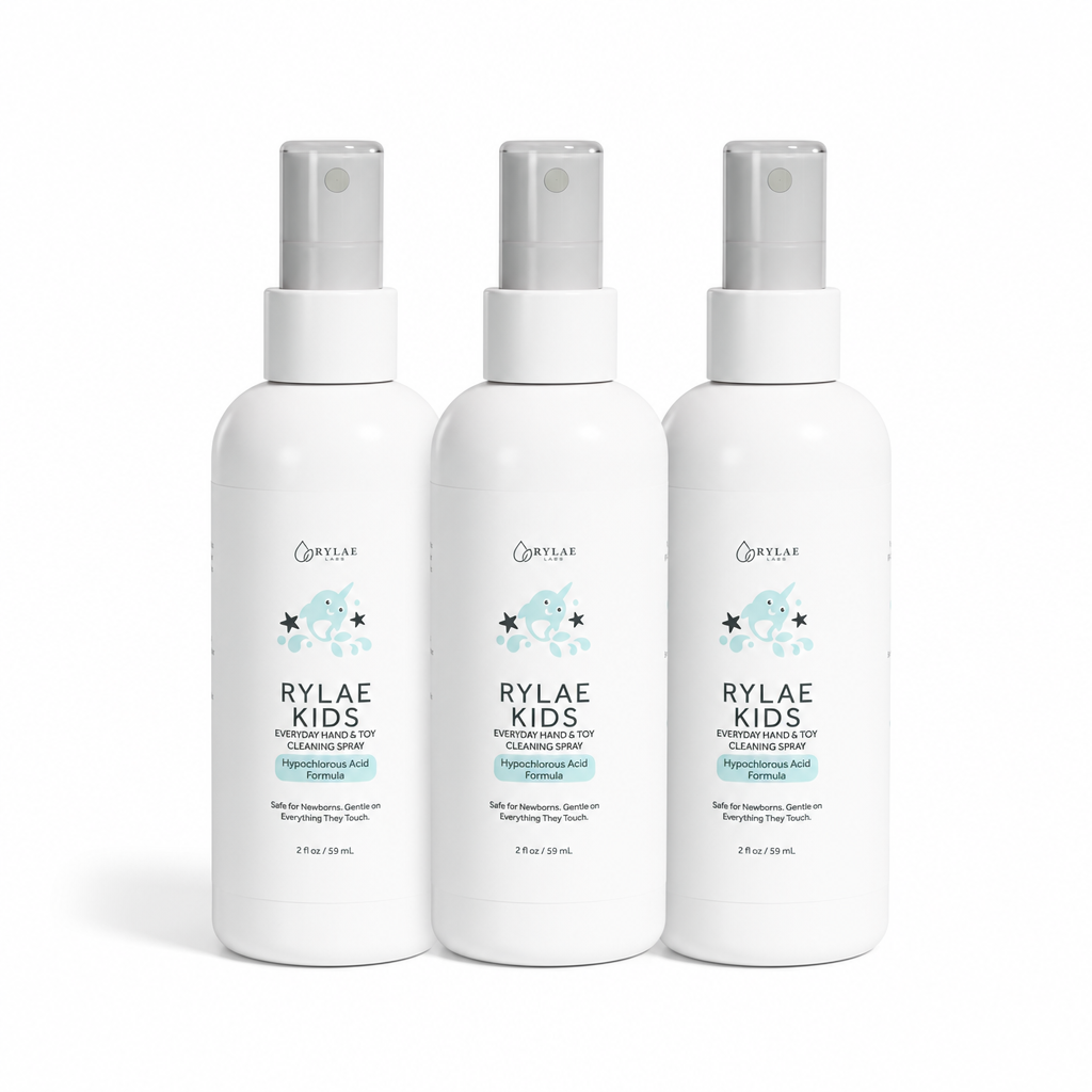 Three Rylae Kids 2oz HOCl cleaning spray bottles on white background